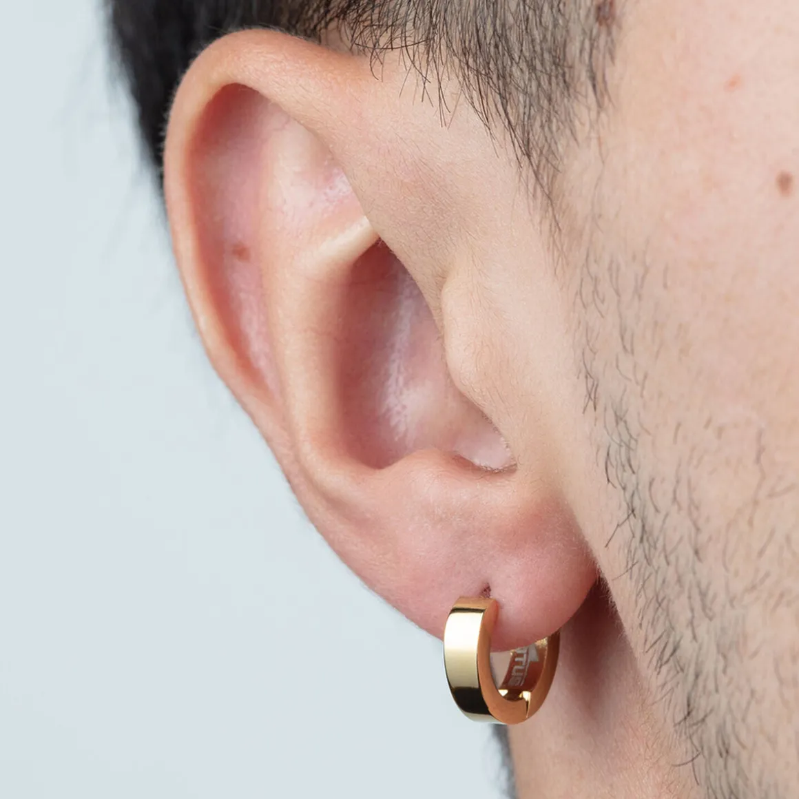 Créoles style homme acier doré