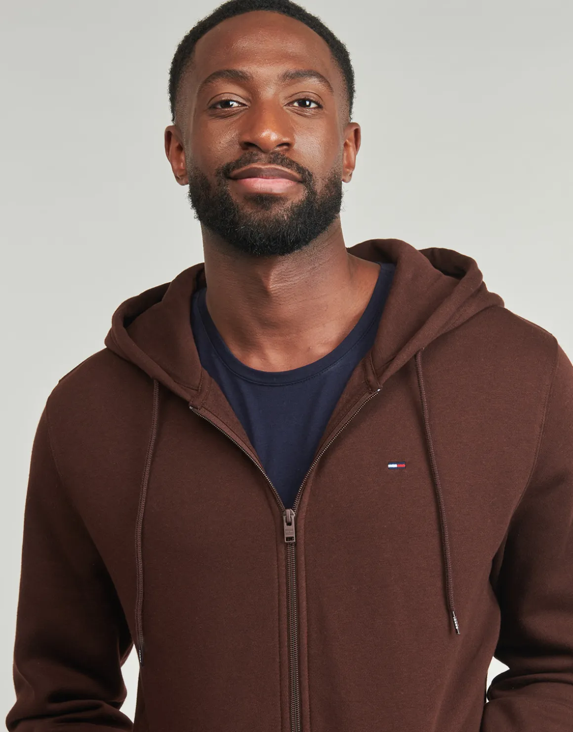 TJM REG S FLAG ZIP THRU EXT